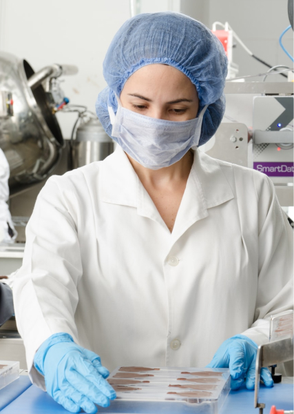 Image of a scientist in a lab coat