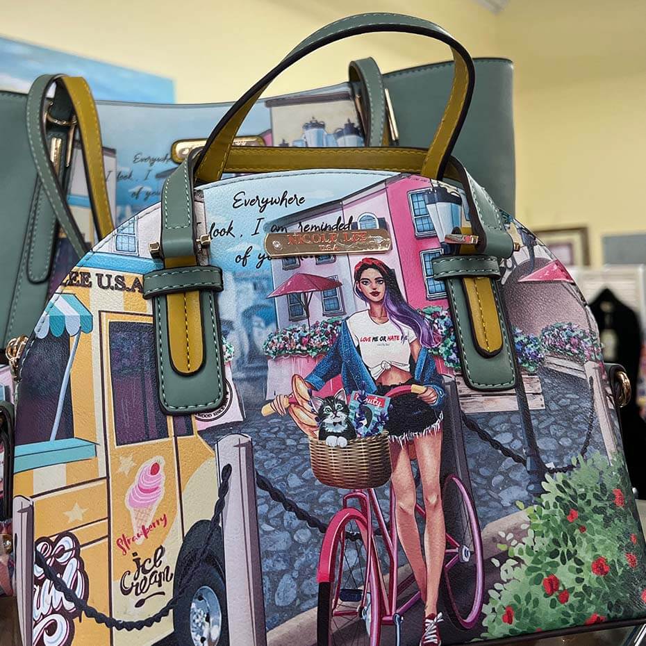 Nicole Lee graphic purse inside Magda and Malena's Boutique in Mount Dora, Florida.