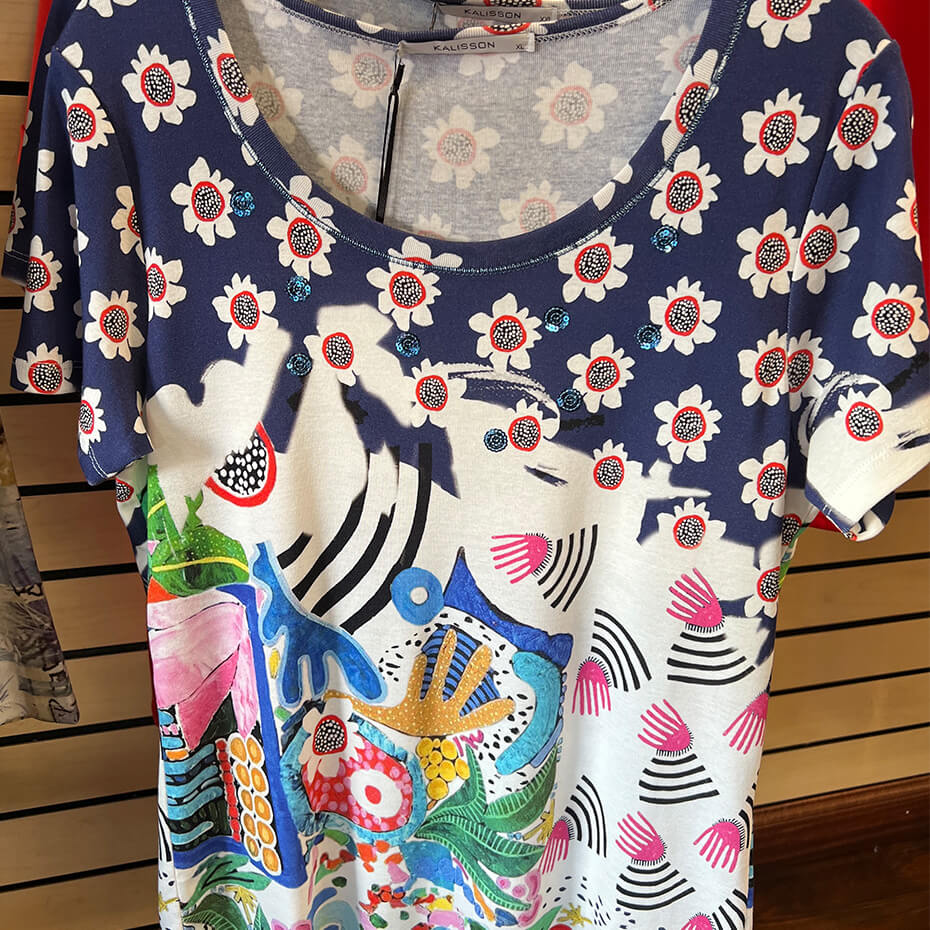 Short-sleeve Kalisson blouse with colorful print at Malena & Magda's Boutique.