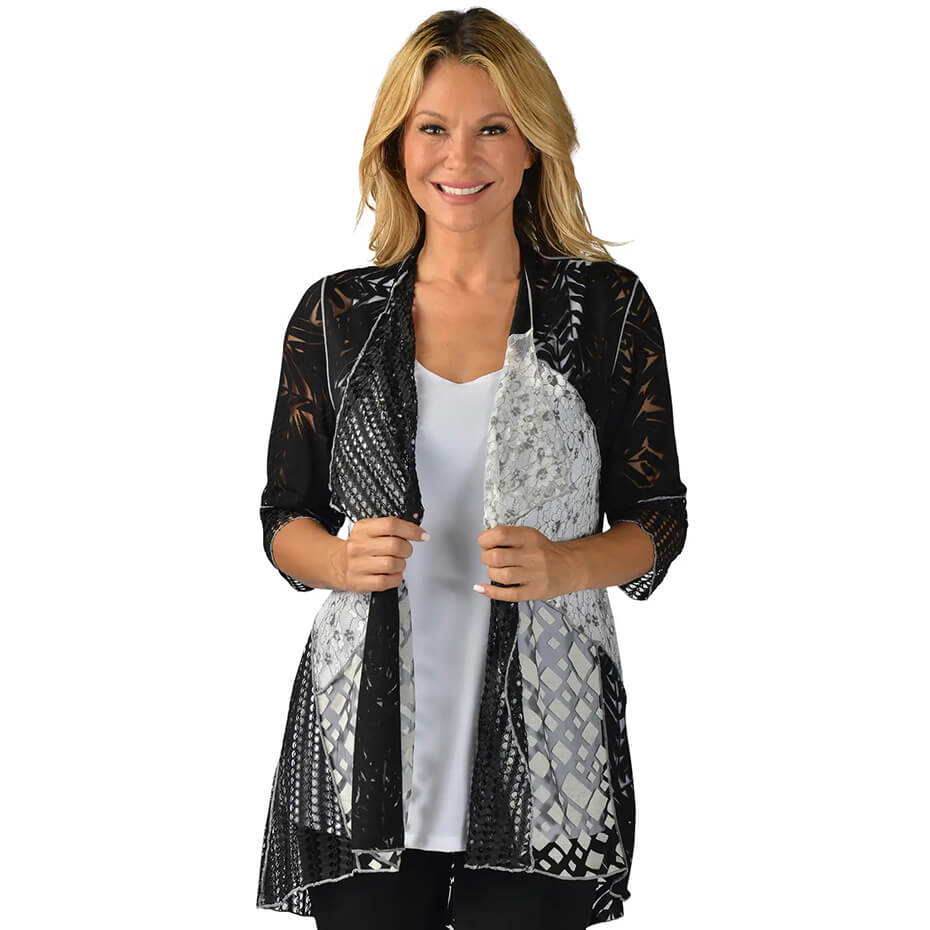 Creation black and white vest at Malena and Magda's Boutique.