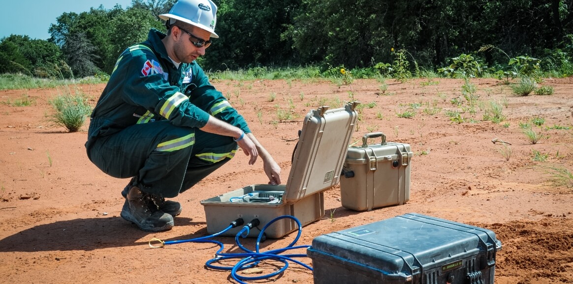 Man working with testing equipment