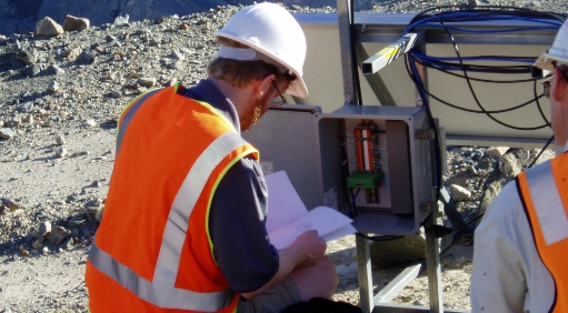 Man working with equipment outside