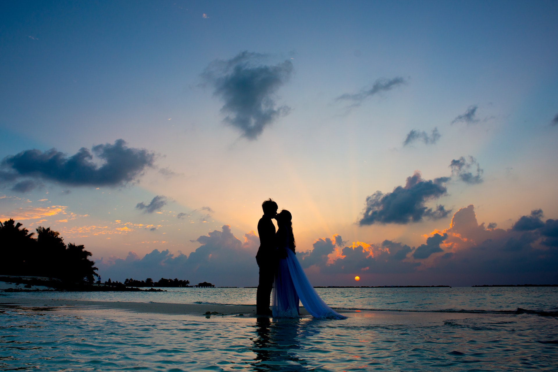 Wedding photos on the beach at sunset