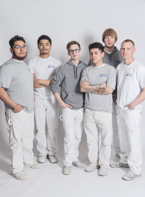 a group photo of all the surface renew technicians