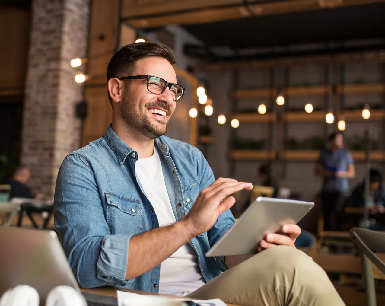 Smiling man with glasses