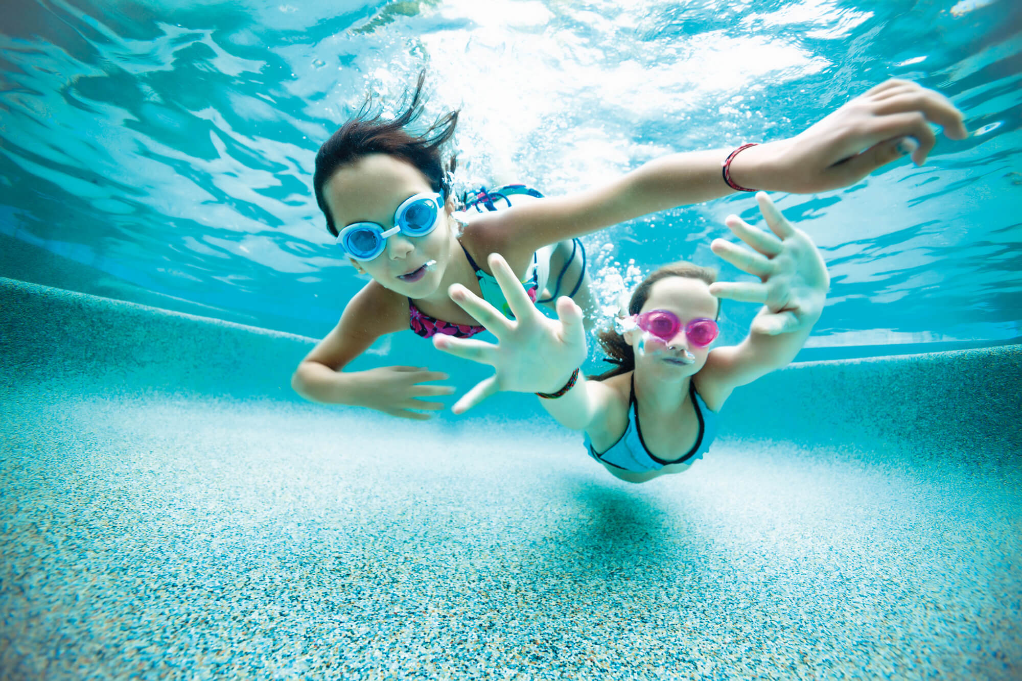 Young swimmers under water