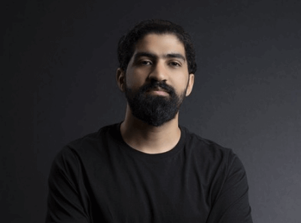 Photo of the author smiling to to the camera