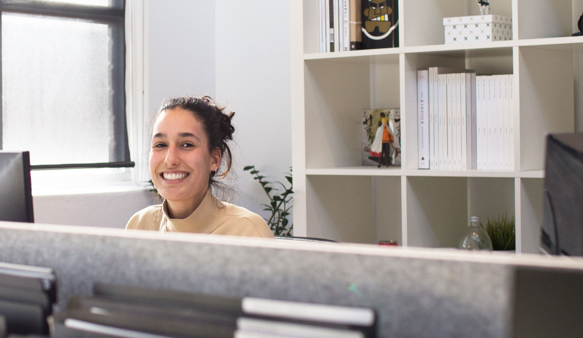 A smiley lady in an office