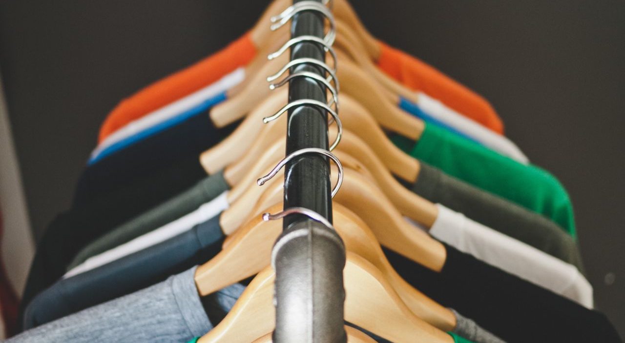 T-shirts handing on a clothes rail