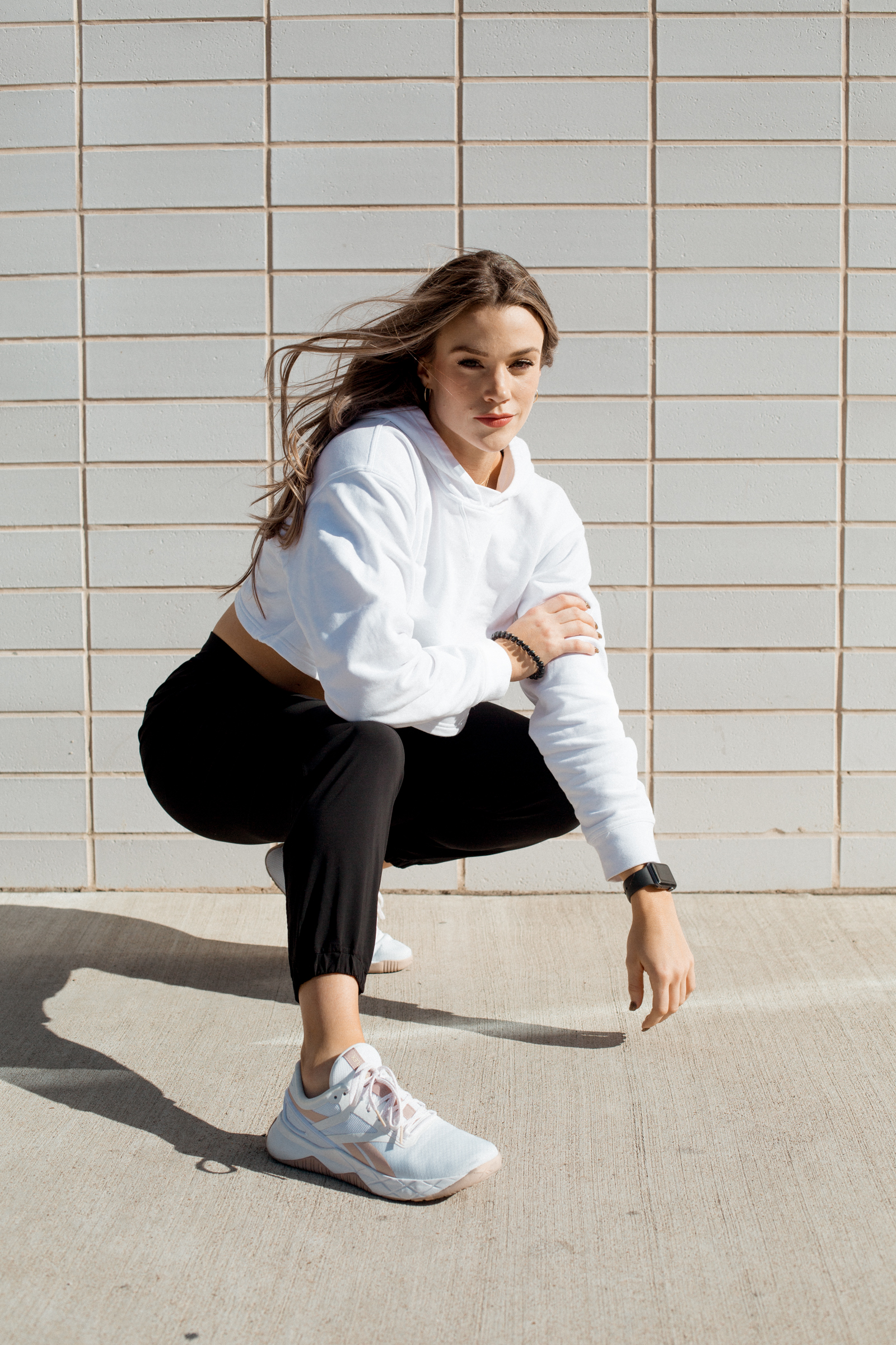 Person kneeling down and stretching