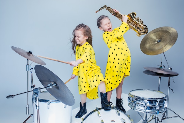 The teen music band performing in a recording studio Free Photo