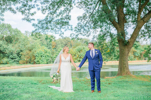 PondPicture-BrideAndGroomHoldingHands-Couple-SimplyPicturesque.jpg
