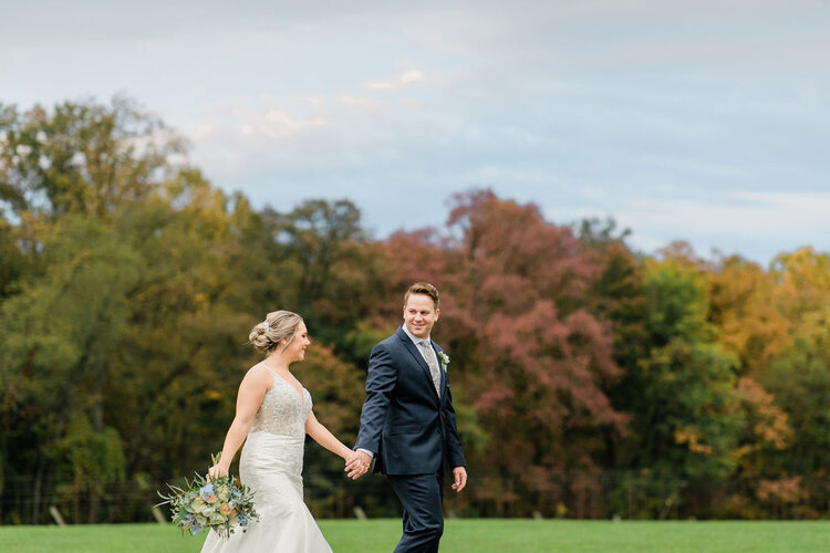 BrideAndGromWalking-BrideAndGroomHoldingHands-JenHarveyPhotography.jpg