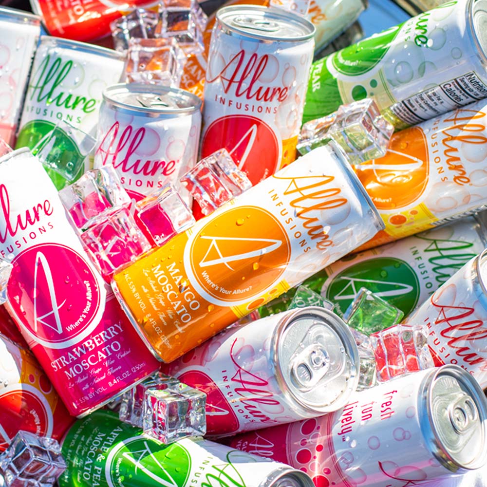 An assortment of Allure Infusions cans packed in an ice bucket