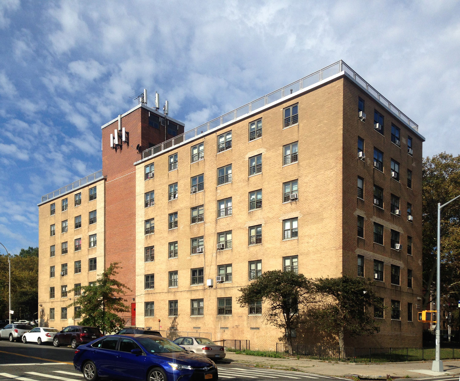 Exterior of Baychester and Murphy apartment building in The Bronx before renovation
