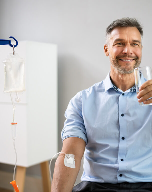 Healthy-looking man receiving IV Therapy