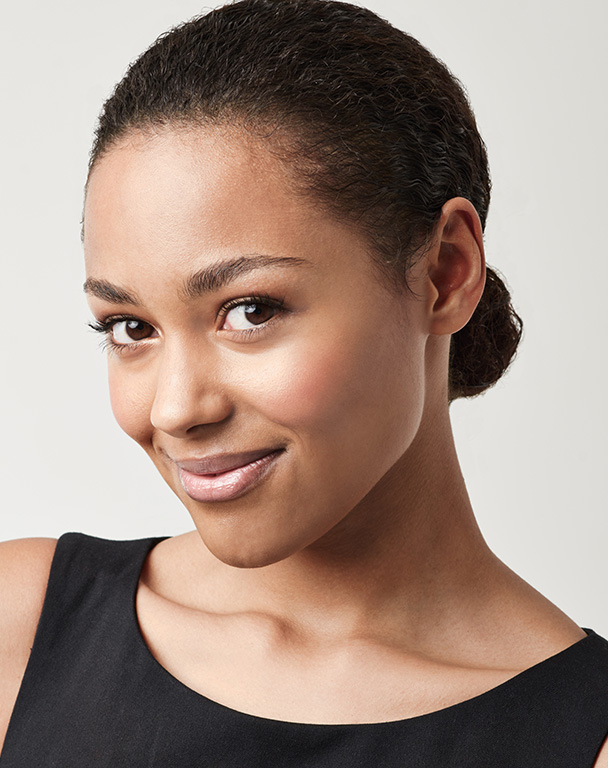 Smiling woman with a slim face