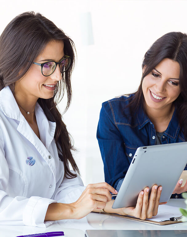 Medical practitioner explaining the Laser Hair Removal process to client