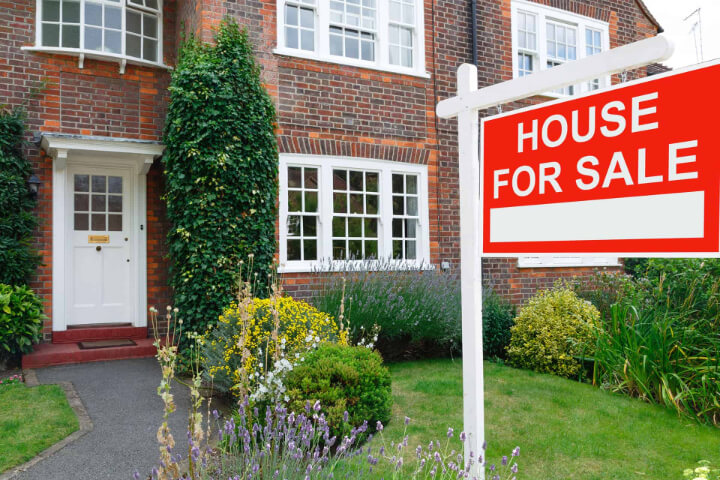 Red House For Sale Sign