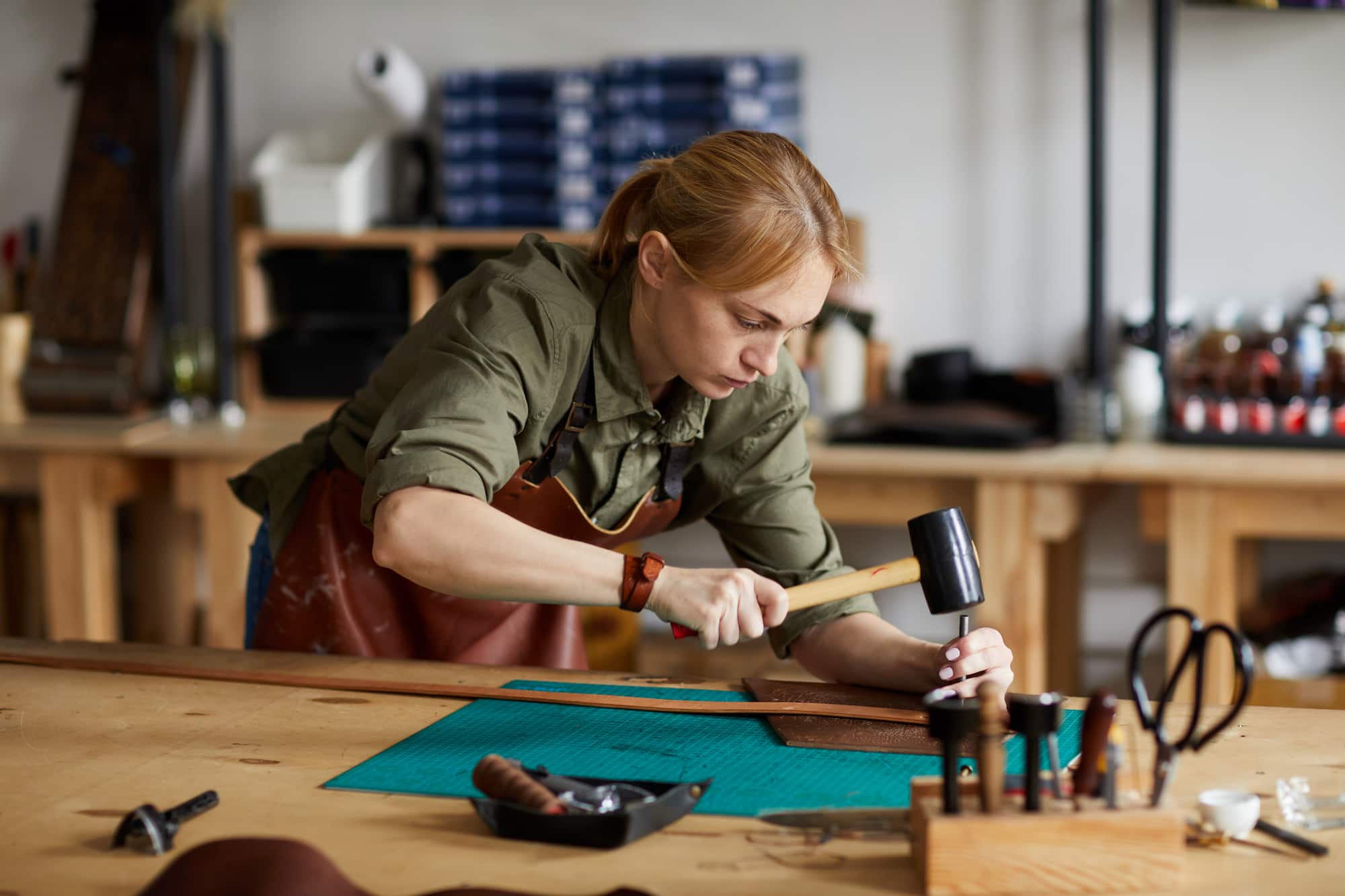 An image of a craft person at work to demonstrate how a large image can be greatly reduced in file size.