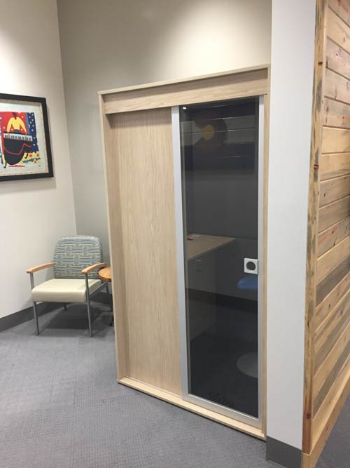 Privacy booth blending in oak