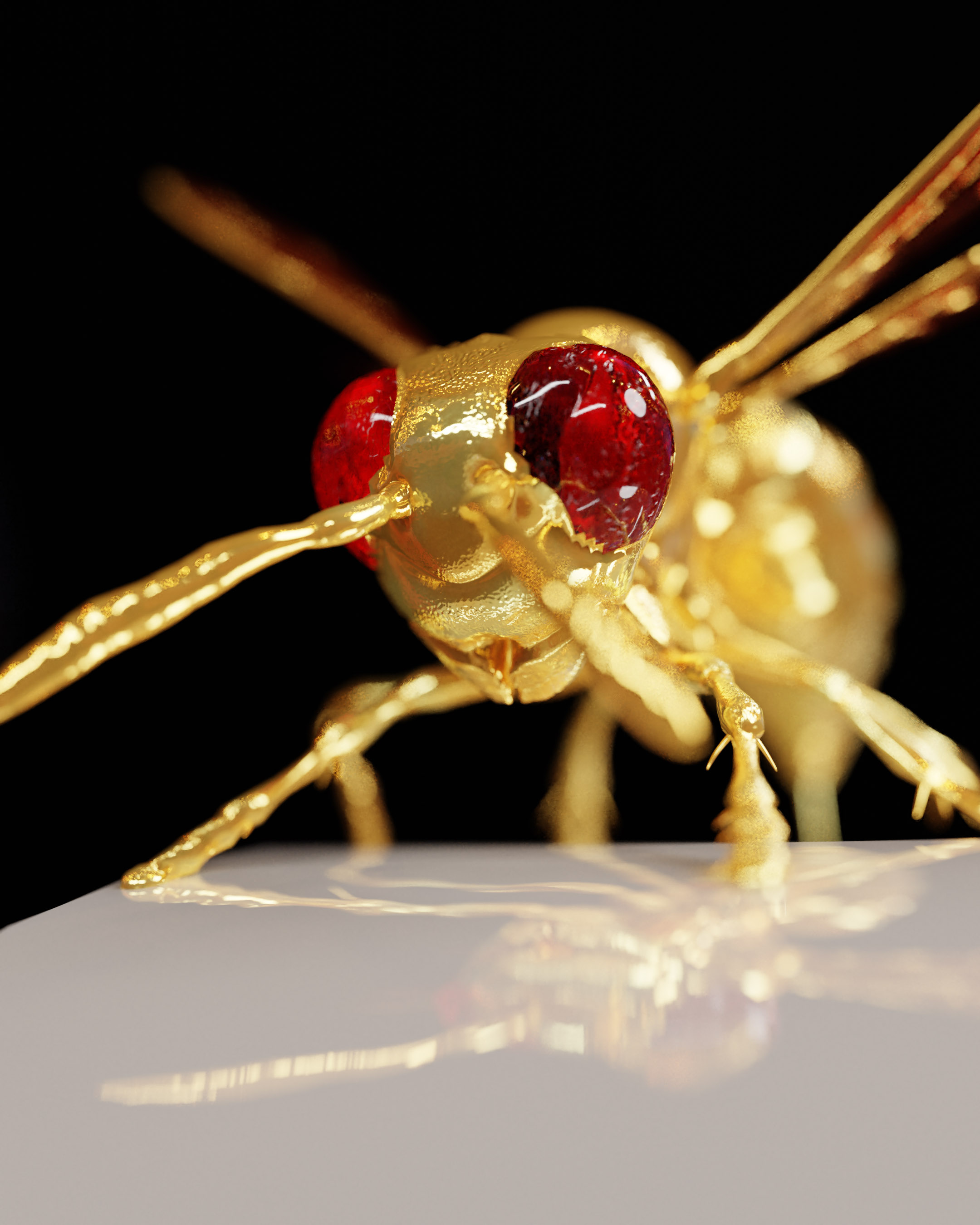 close up head on view of a golden hornet on a metal letter