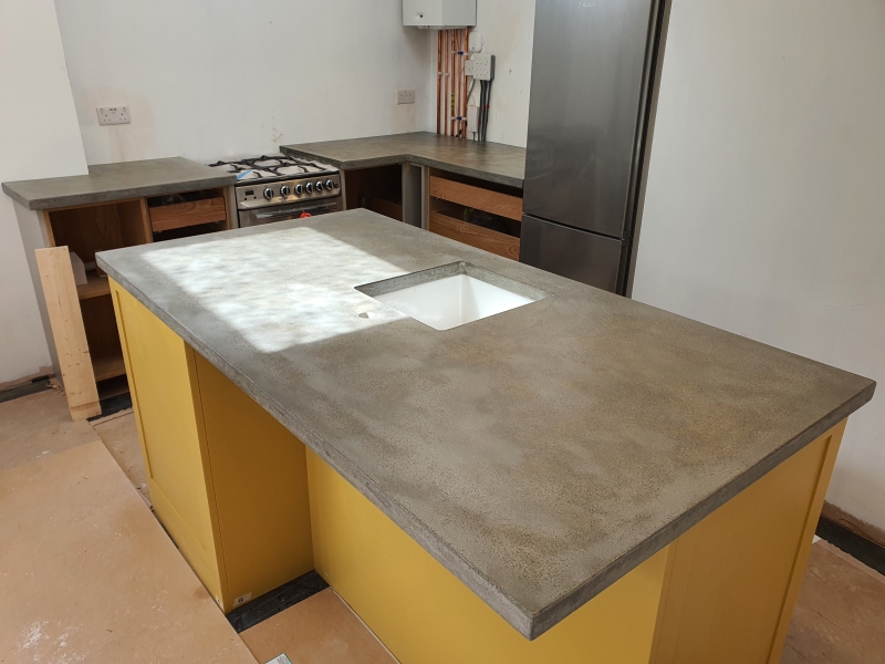 Bespoke kitchen worktops cement grey with aggregateLondon