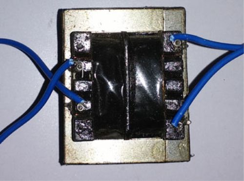 Contoh transformator pada rangkaian lampu emergency