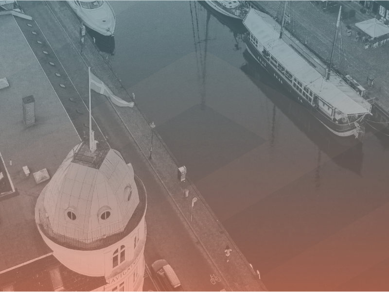 top down image of boats on a river
