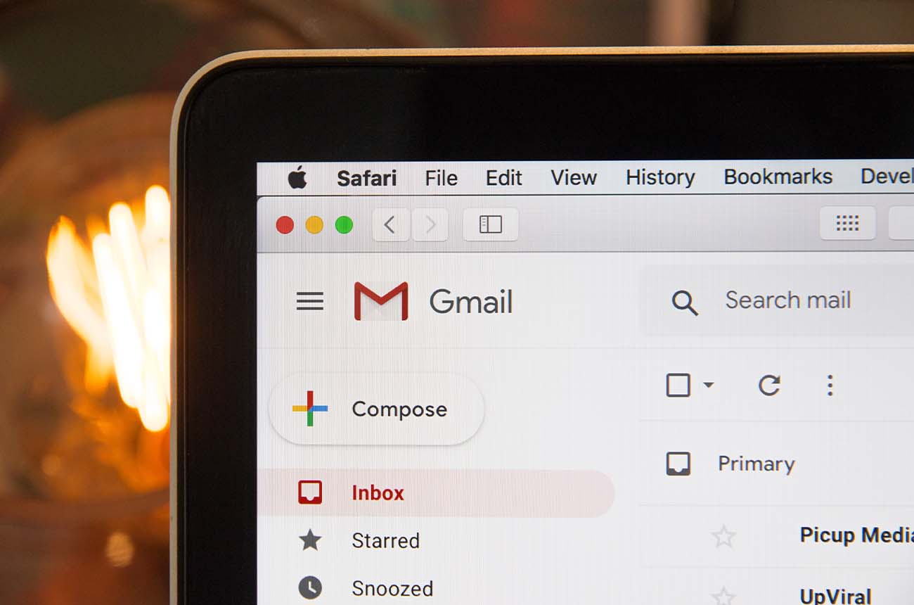 Upclose image of a laptop showting a Gmail inbox