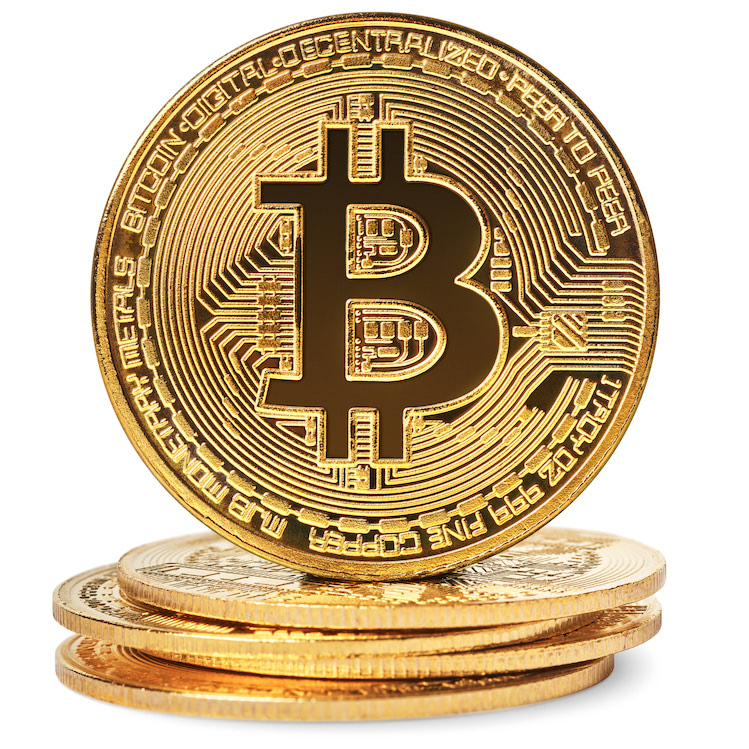 A photo of a physical gold Bitcoin