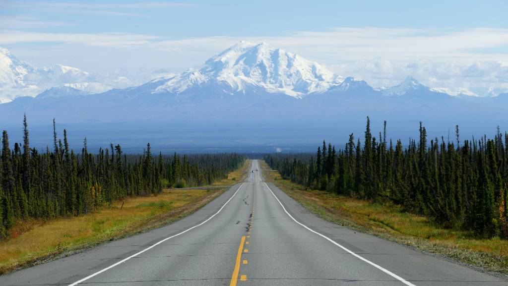 road with mountain in the distance in Alaska.