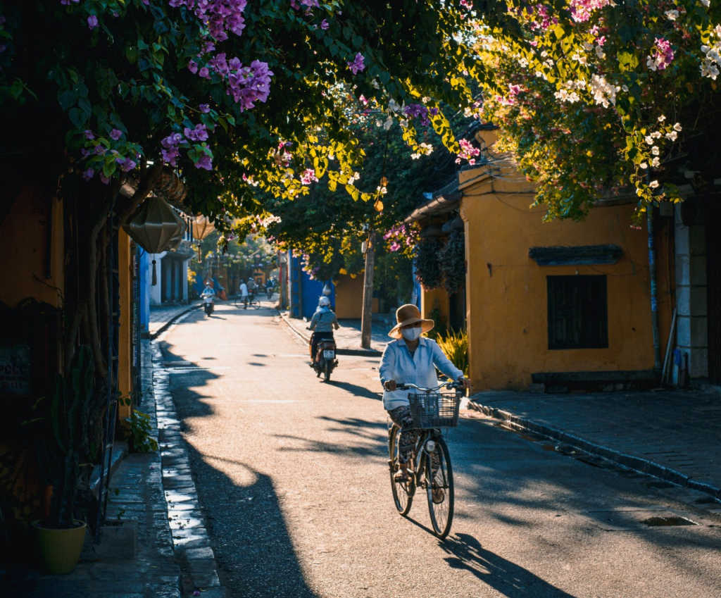 person biking down the street in Hoi An.