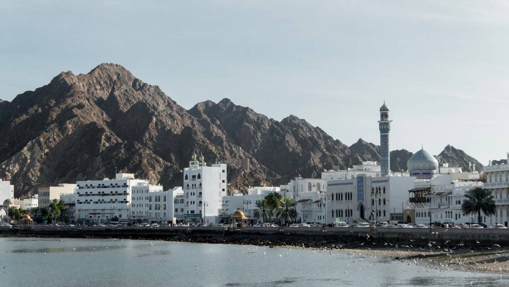 typical low white buildings in Oman.