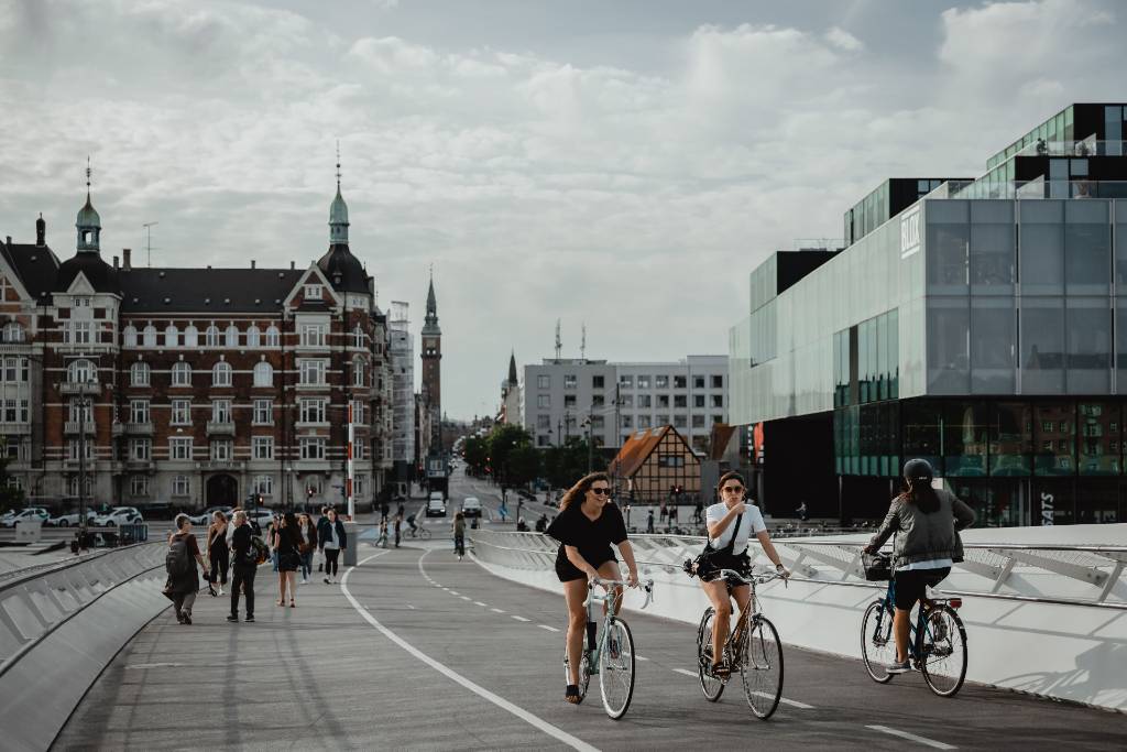 People bicycling in Denmark.