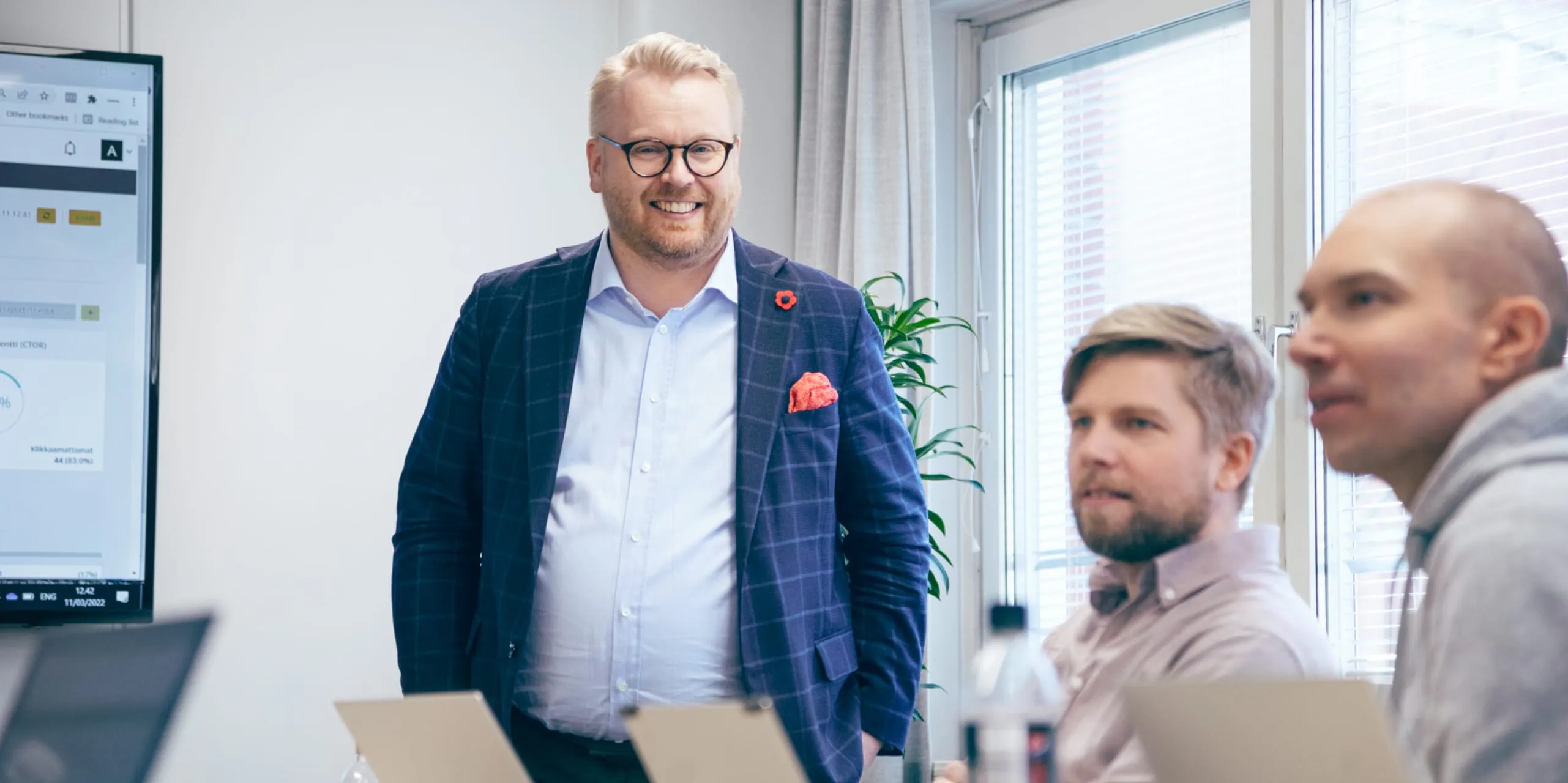 Three colleagues in a meeting in the Funidata office