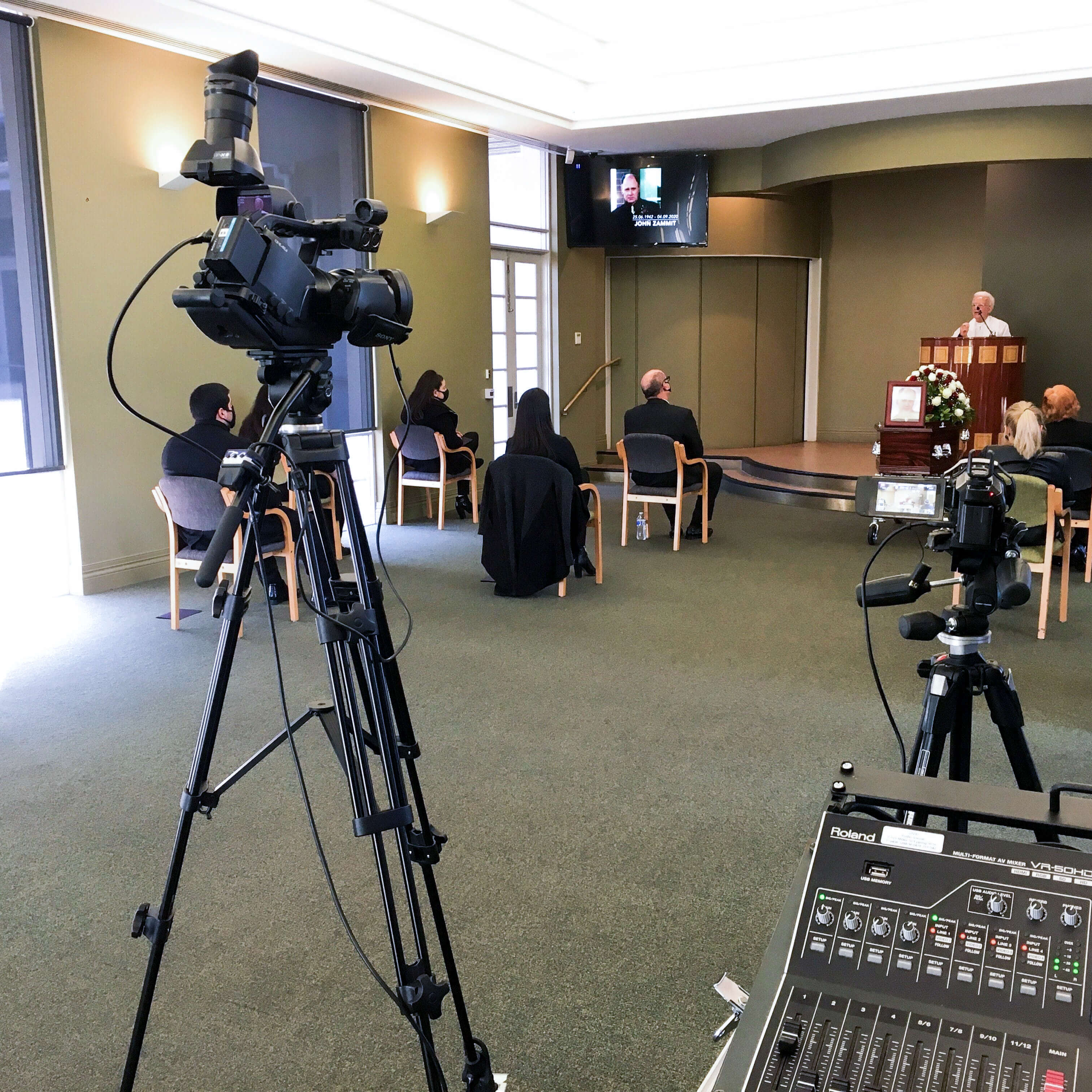 Video camera streaming a funeral event