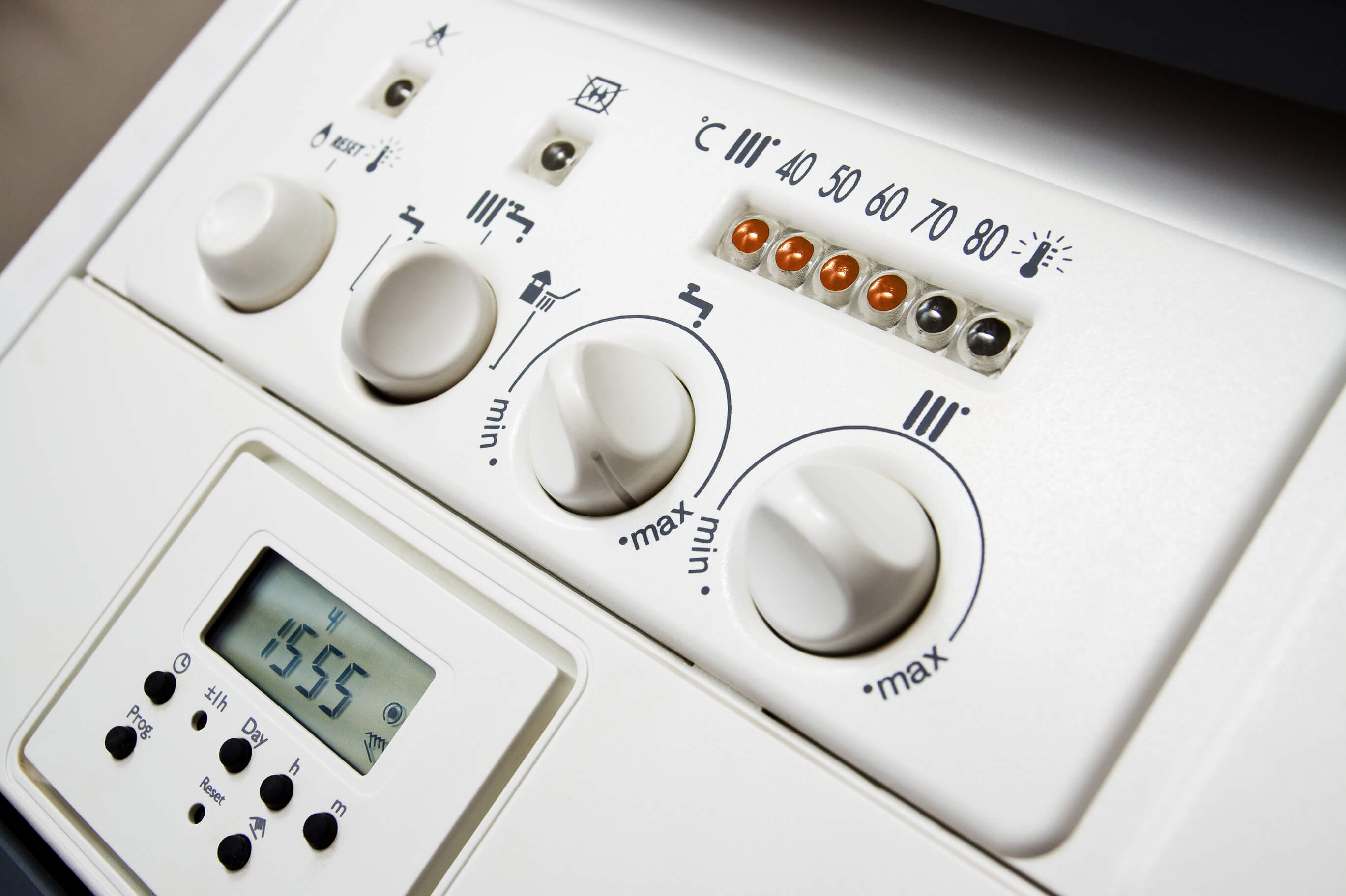 white combi boiler panel with temperature gauge