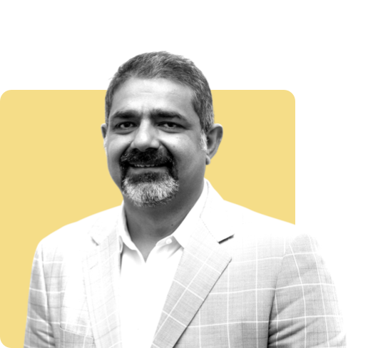 Black and white headshot of Torc board member Karim Lakhani