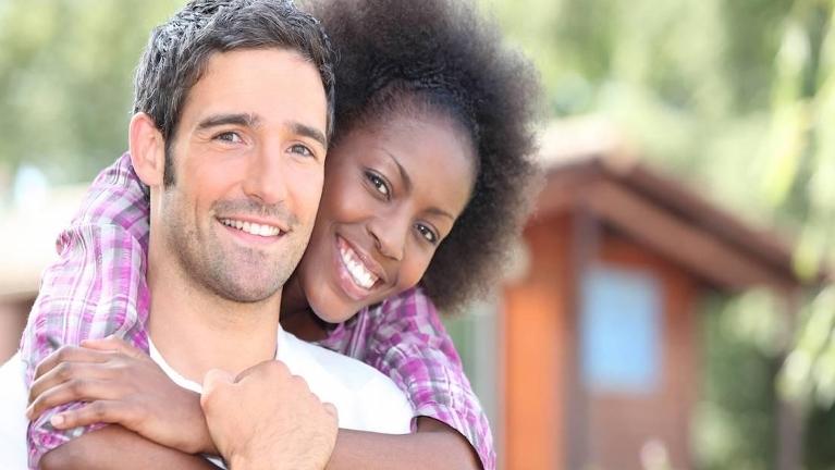Couple Hugging | Dental Extractions in Huntsville, AL