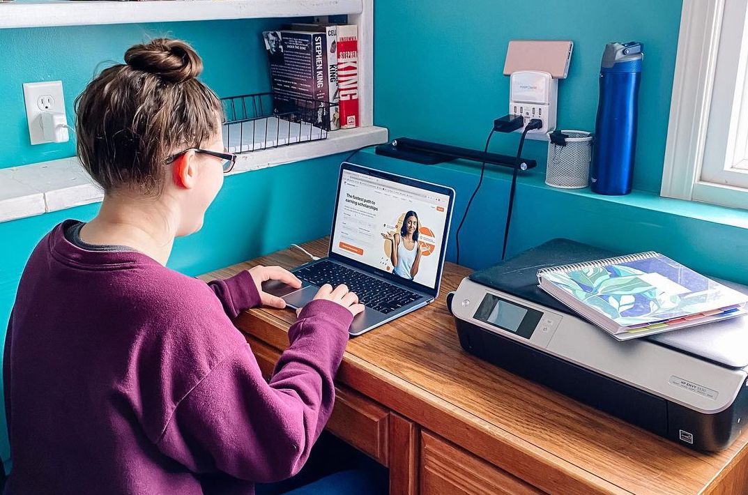 woman watching content on laptop