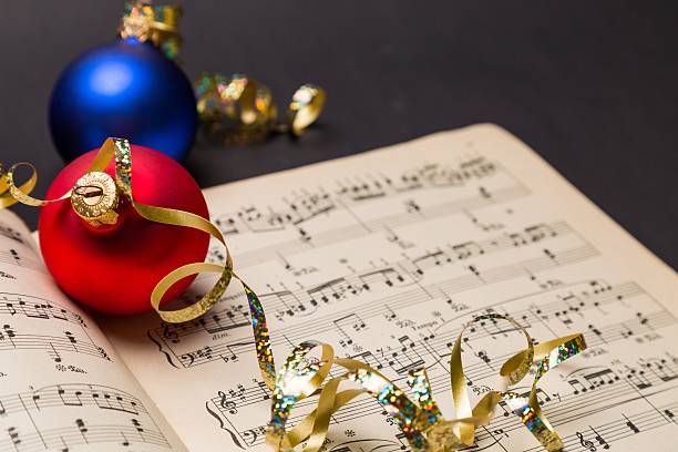 Christmas ornaments on sheet music