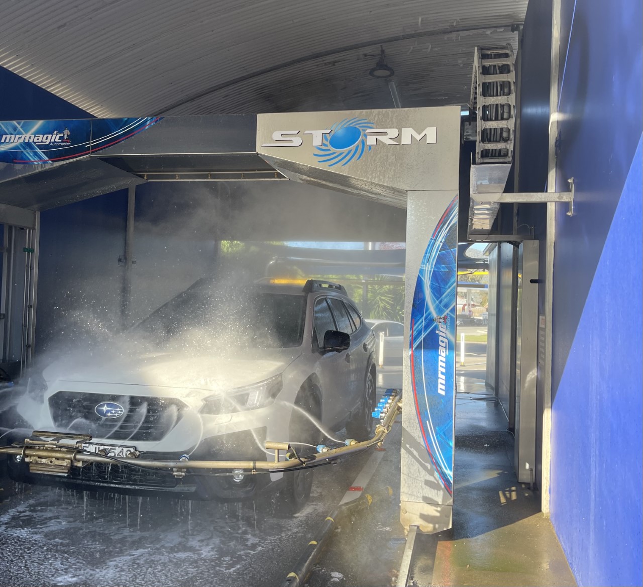 Should I choose the Auto Wash or SelfServe Bay to wash my car