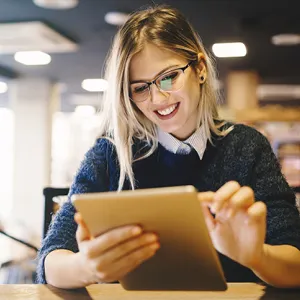 Woman tracking a transaction on her tablet