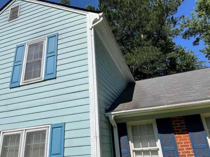 Town Home, New Nichiha Siding, Gutters and Downspouts. Keystone