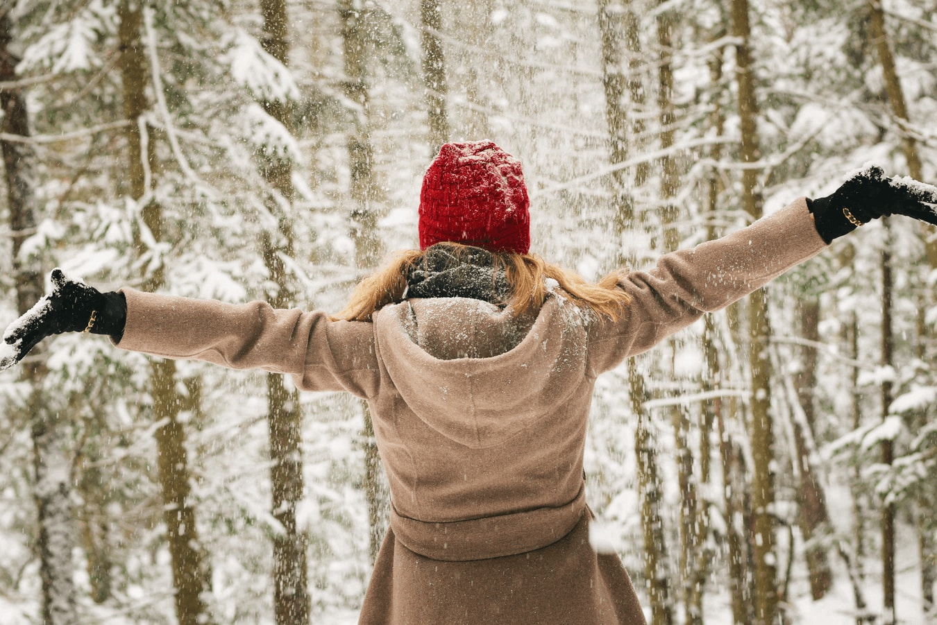 Woman enjoying winter snow in Lake Tahoe