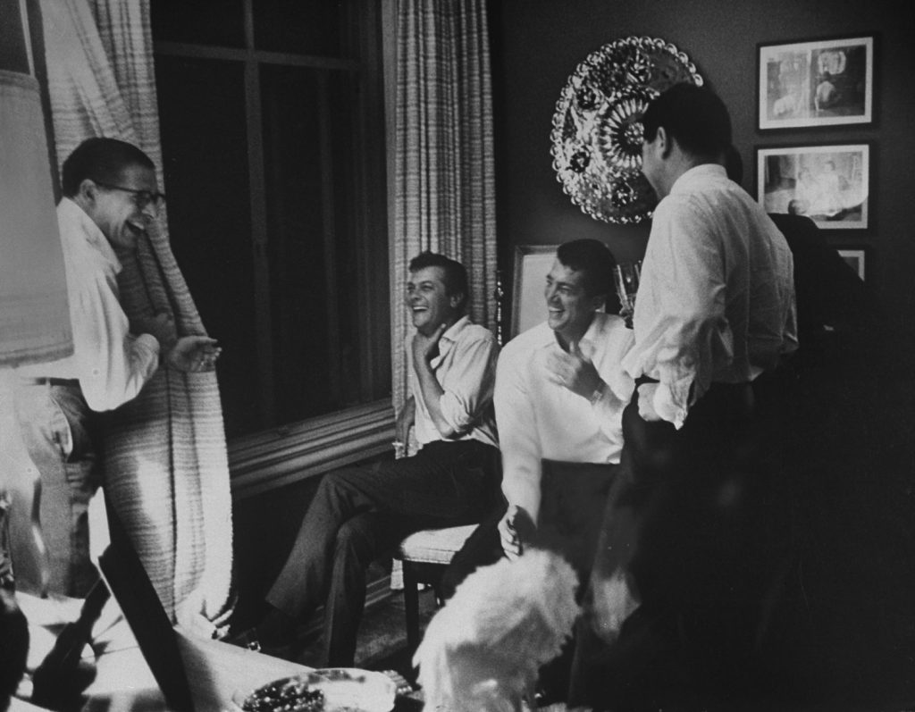 A room full of laughing men.