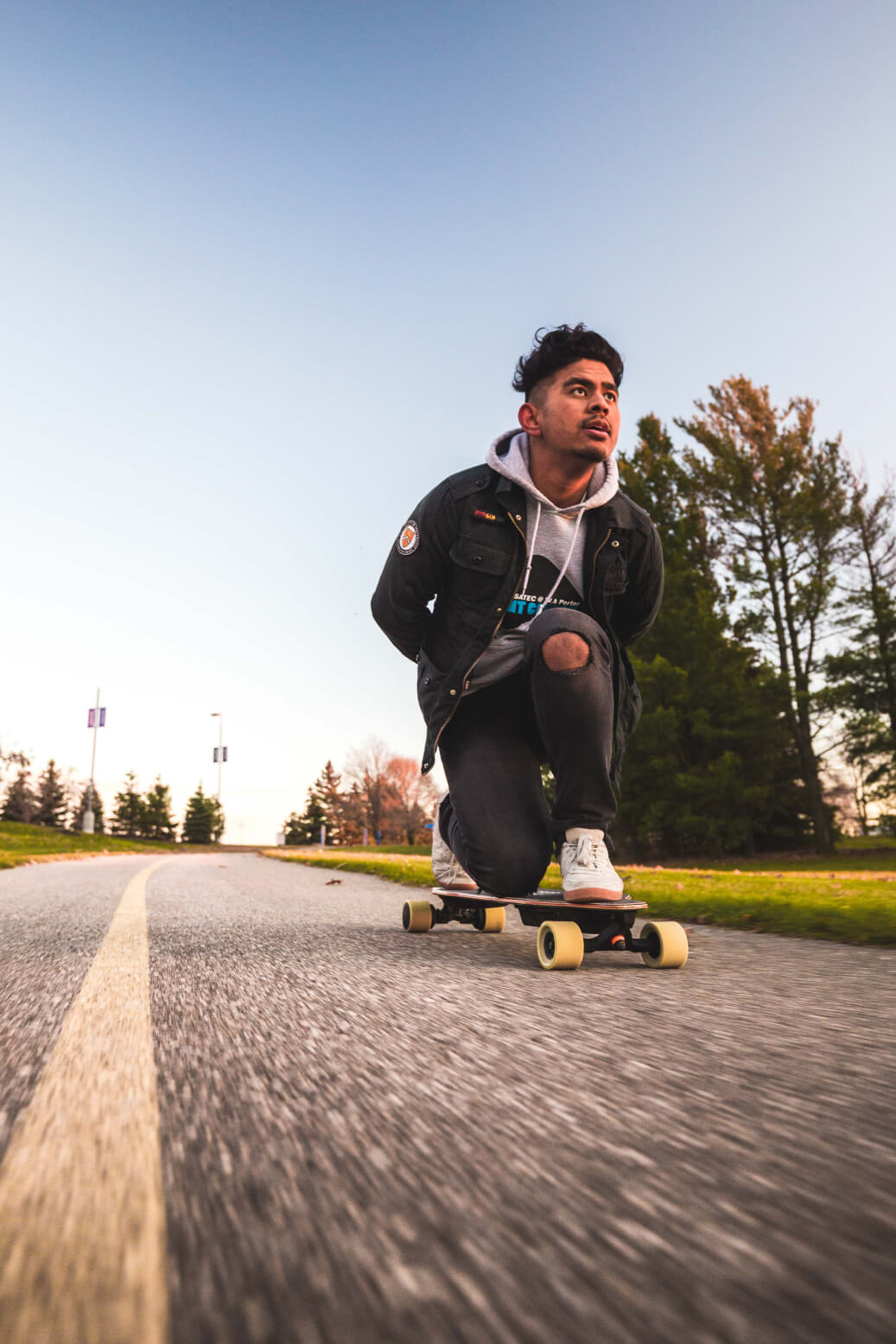 man riding a longboard fast,  Setsail Marketing Work